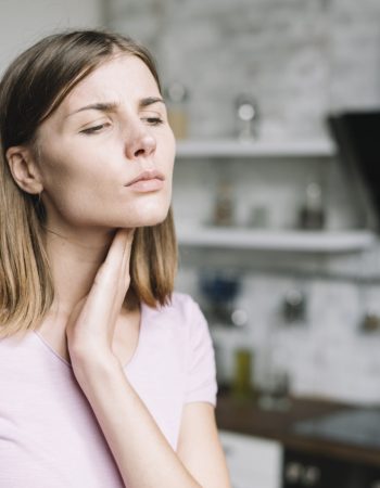 close-up-young-woman-having-neck-pain
