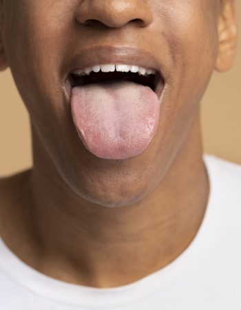 front-view-man-sticking-out-tongue